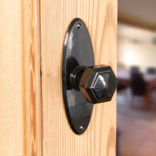 No. 6829 Mottled Brown real Bakelite hexagonal door knobs with oval back plate. Also available in Black.