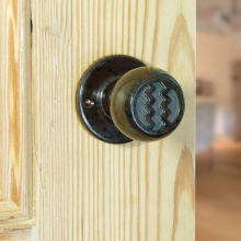 No. 6822 Mottled Brown real Bakelite (what we call) Zig Zag door knob with round back plates. Also available in Black.